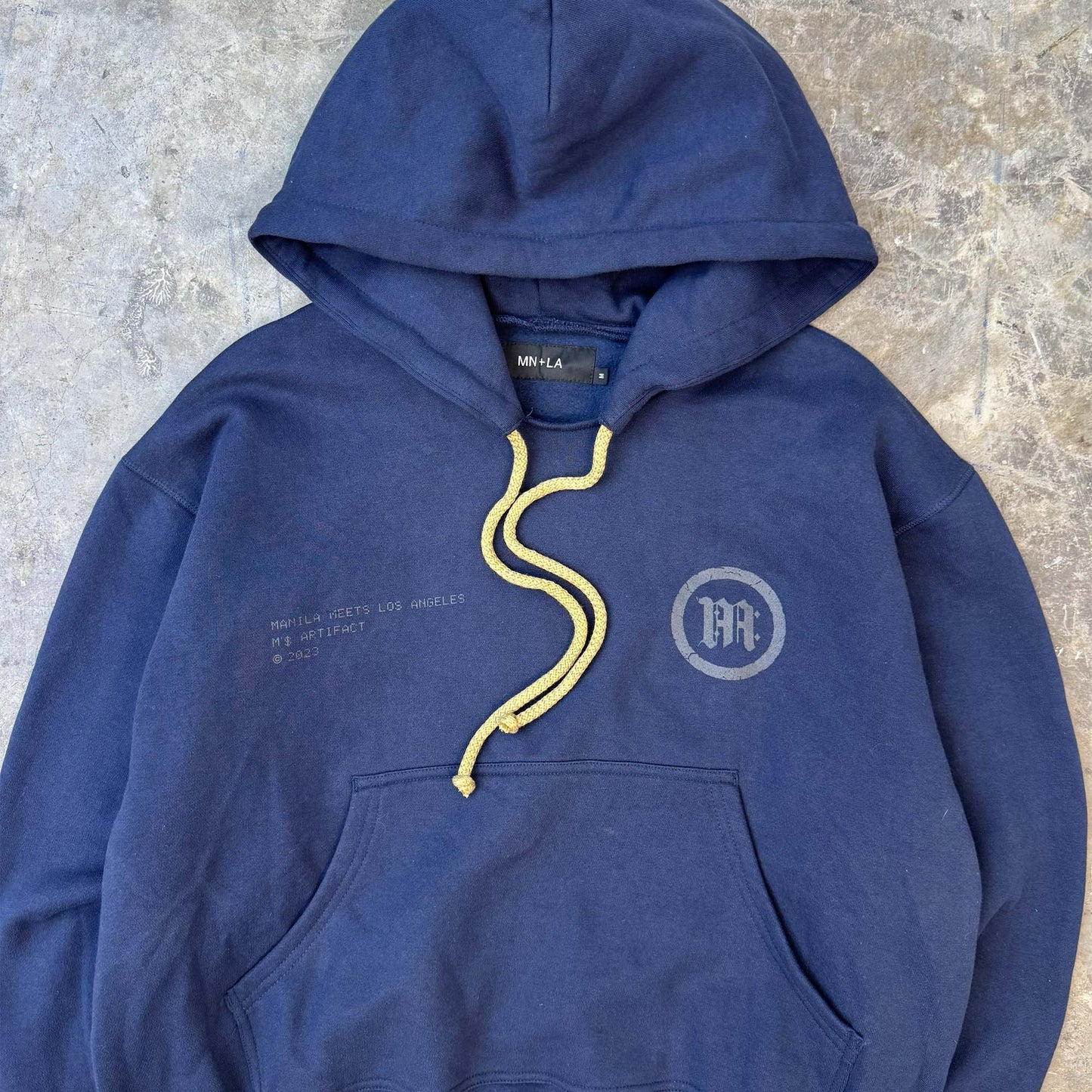 "M'$ ARTIFACT II" HOODIE IN NAVY