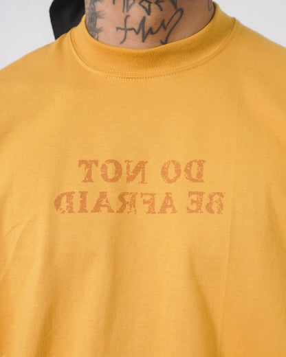 "DO NOT BE AFRAID" TEE IN MUSTARD