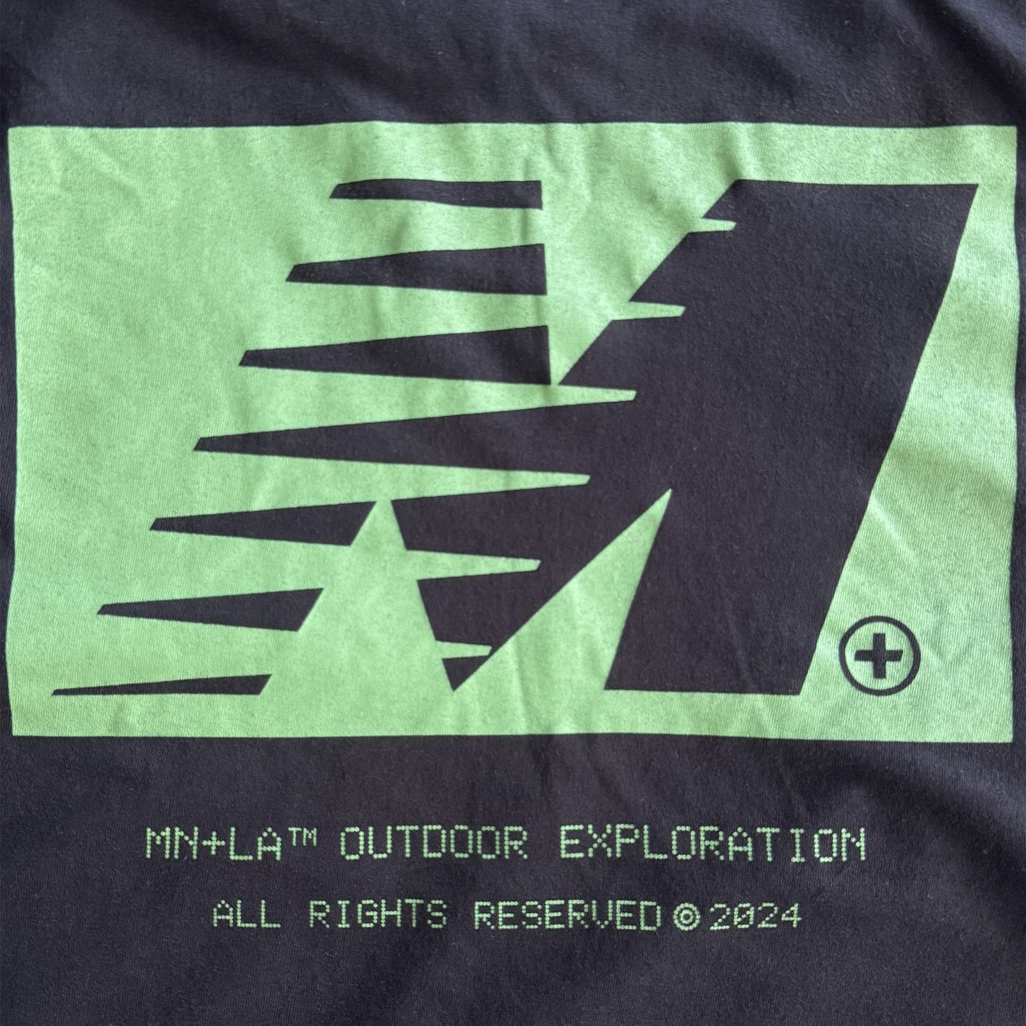 "OUTDOOR EXPLORATION" TEE IN GREEN GLOW