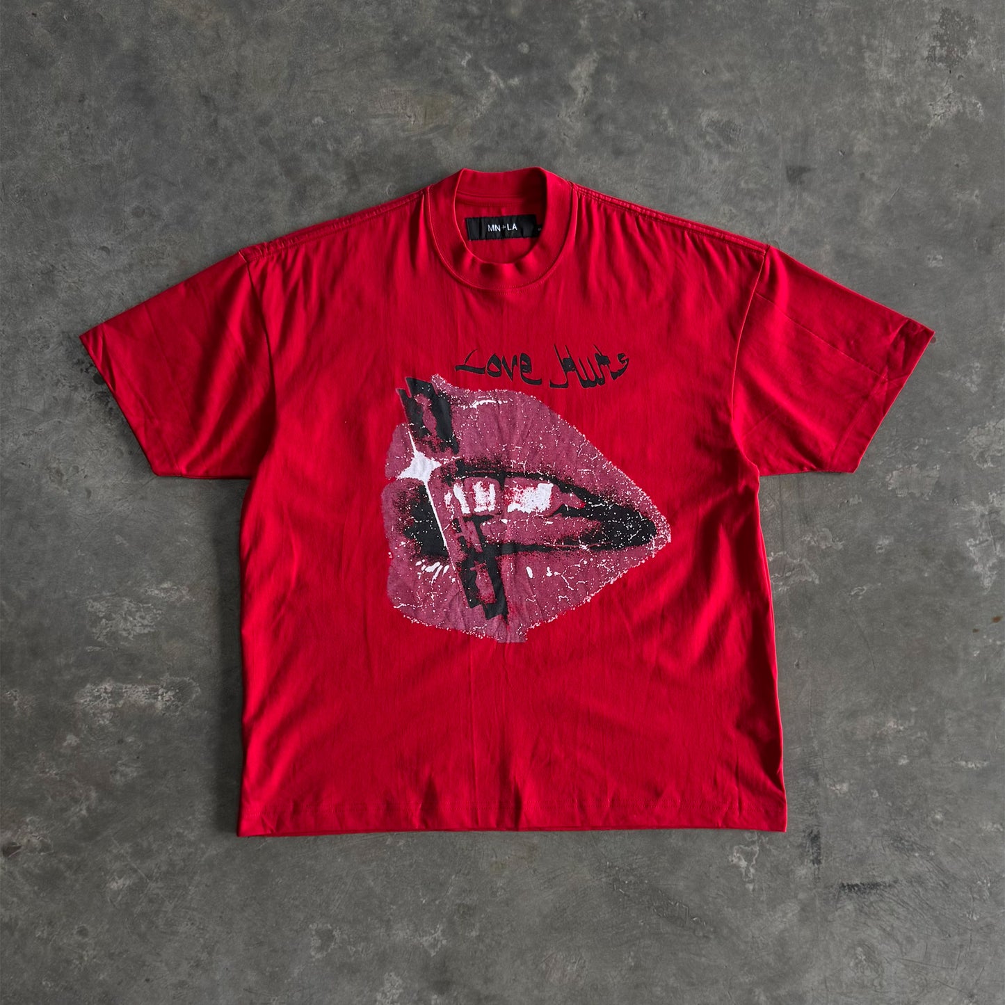 "LOVE HURTS" TEE IN RARRI RED
