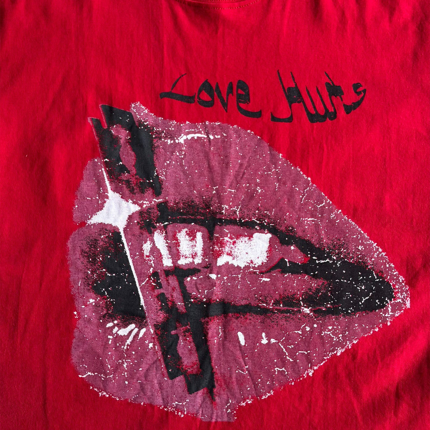 "LOVE HURTS" TEE IN RARRI RED