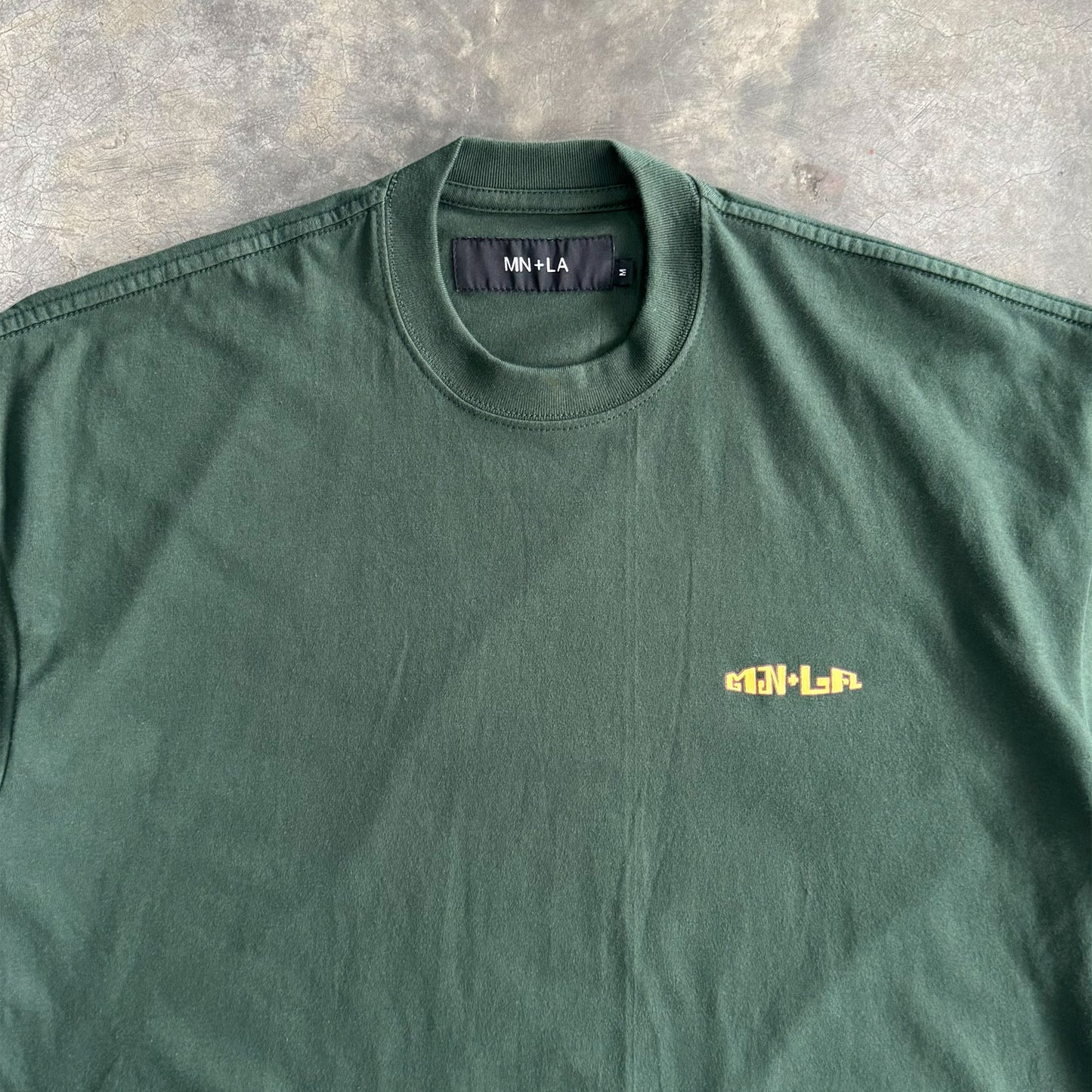 "THAI" LOGO TEE IN HUNTER GREEN