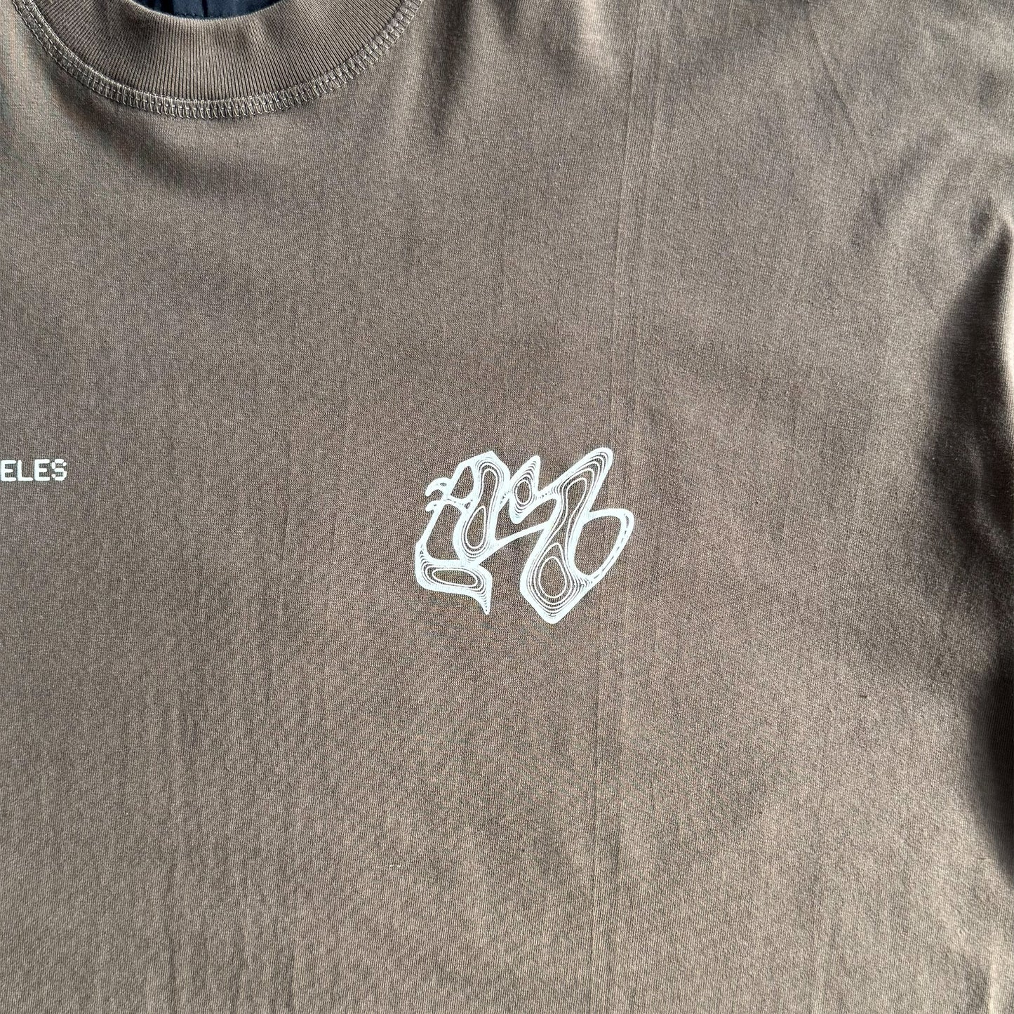 M'$ RIFT VAST TEE IN OLIVE