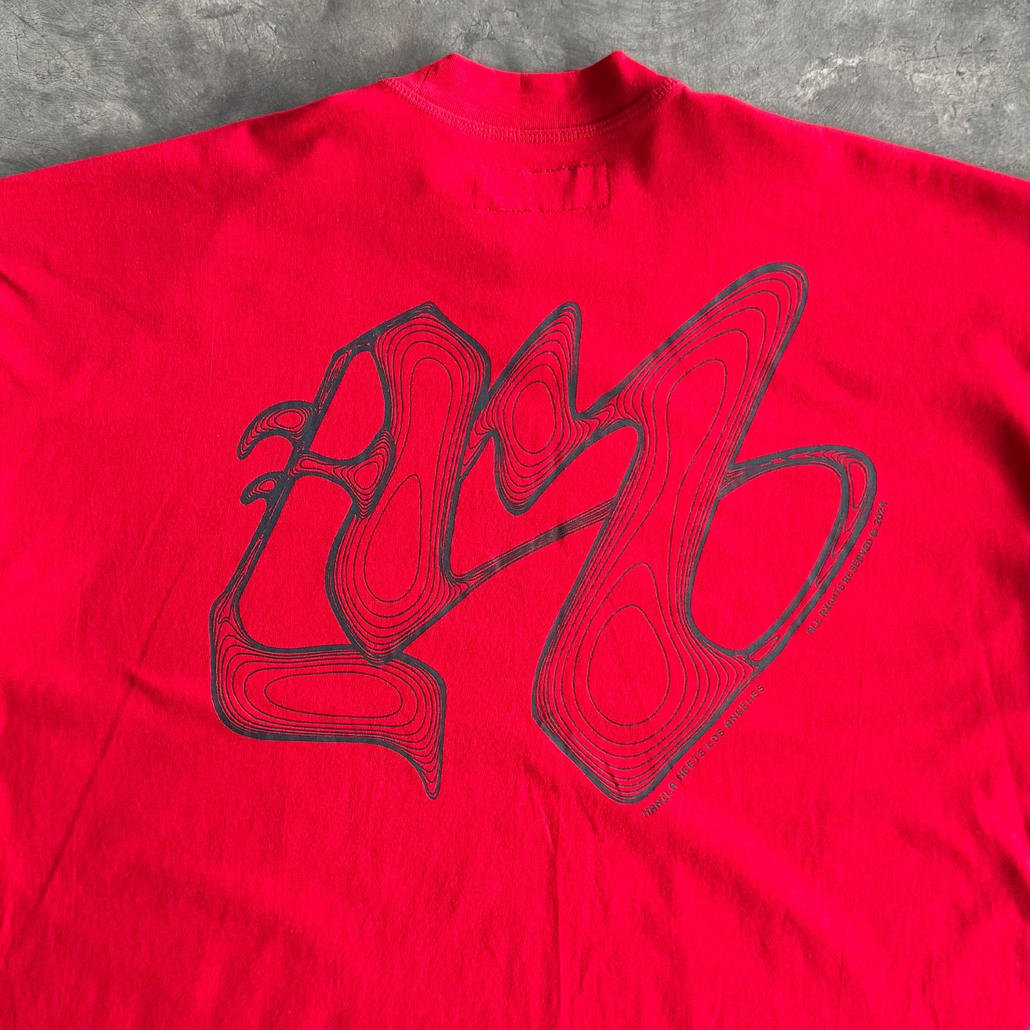 M'$ RIFT VAST TEE IN RARRI RED