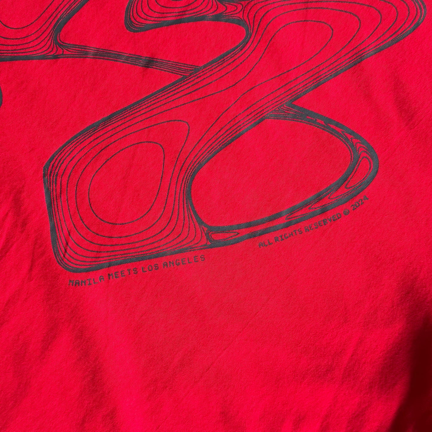 M'$ RIFT VAST TEE IN RARRI RED