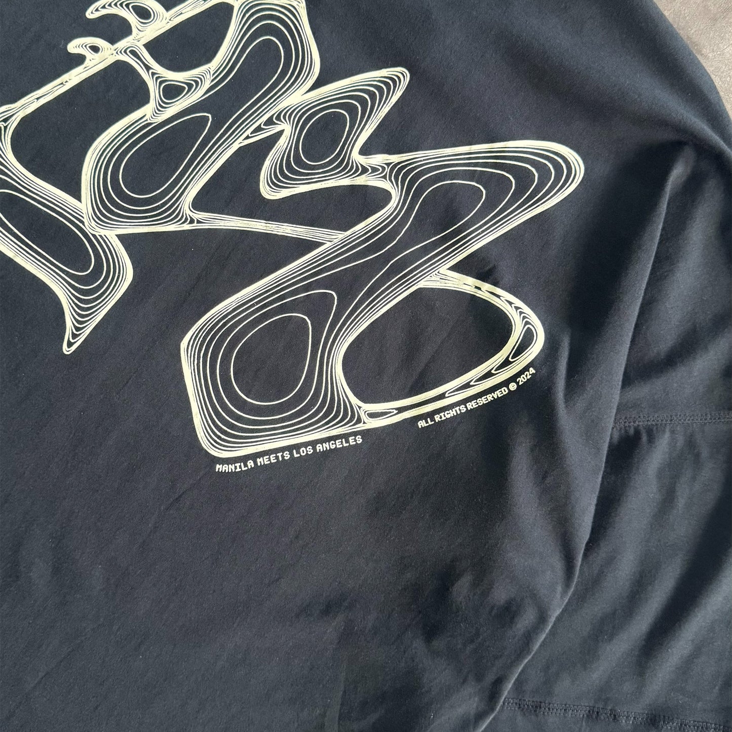 M'$ RIFT VAST TEE IN CAVIAR