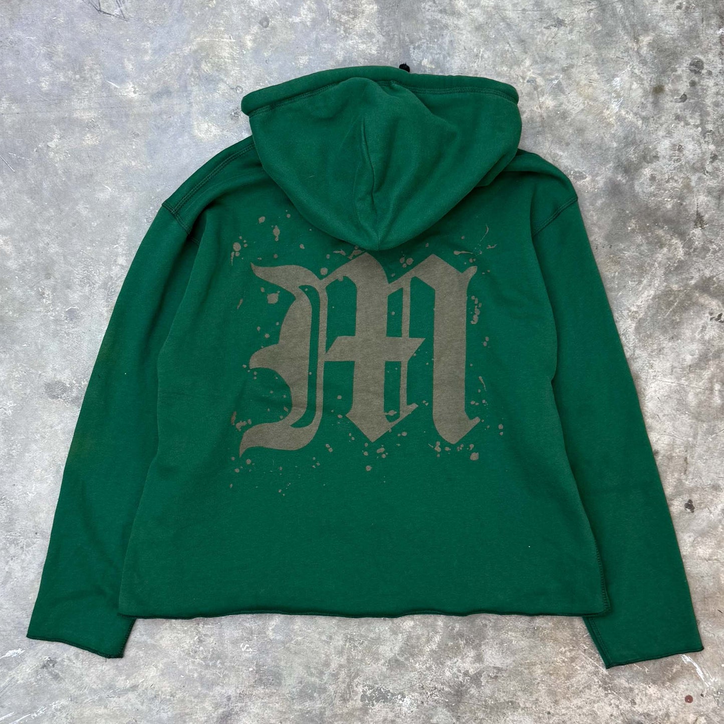 "M'$ SPECKS V2" CUTOFF HOODIE IN HUNTER GREEN