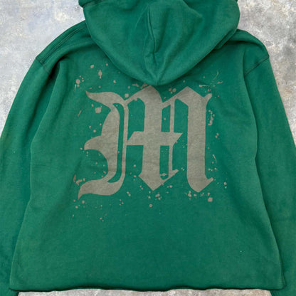 "M'$ SPECKS V2" CUTOFF HOODIE IN HUNTER GREEN