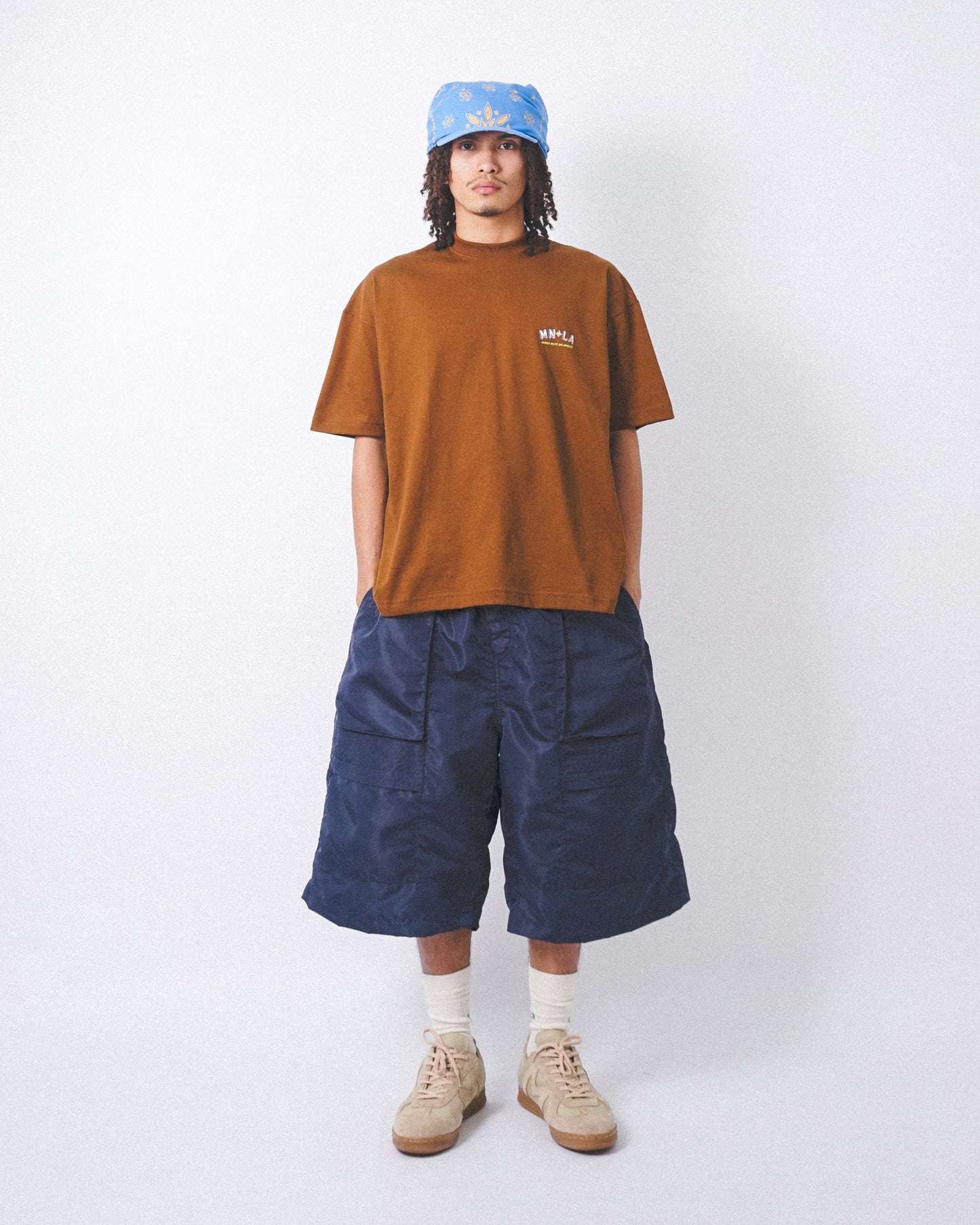 "GOLDEN COAST" TEE IN RUST