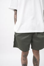 HOUSE SHORTS IN MOSS GREEN