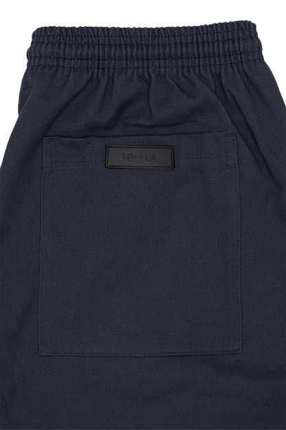 PLEATED ULTRA WIDE PANTS IN NAVY