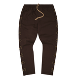 "M'$ & BEYOND" TRACK PANTS IN WOOD