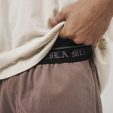 TRAINING SHORTS IN MAUVE