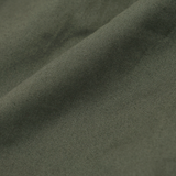 PLEATED HOUSE SHORTS IN MOSS GREEN
