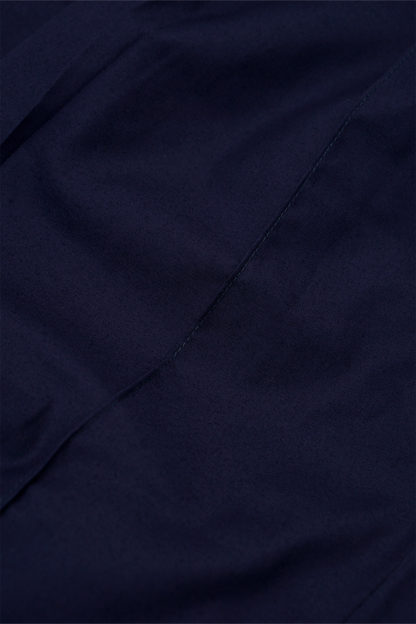 PLEATED WIDE CROPPED PANTS IN NAVY