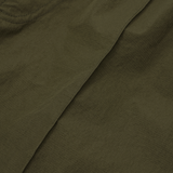SHINOBI PLEATED HOUSE SHORTS IN OLIVE