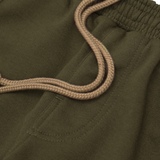 PLEATED HOUSE SHORTS IN OLIVE