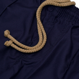 PLEATED WIDE CROPPED PANTS IN NAVY