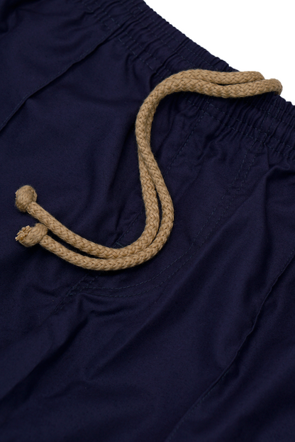 PLEATED WIDE CROPPED PANTS IN NAVY