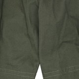 PLEATED HOUSE SHORTS IN MOSS GREEN