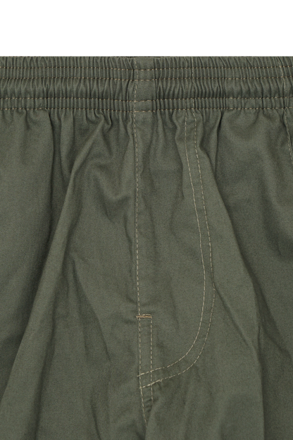 PLEATED HOUSE SHORTS IN MOSS GREEN