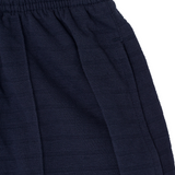 STRIPED PIQUE PLEATED ULTRA WIDE PANTS IN NAVY