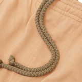 WAFFLE WEAVE PLEATED CROPPED PANTS IN WHEAT