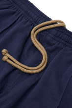 WAFFLE WEAVE PLEATED HOUSE SHORTS IN NAVY BLUE