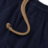 STRIPED PIQUE PLEATED ULTRA WIDE PANTS IN NAVY