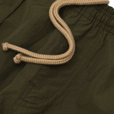 SHINOBI PLEATED HOUSE SHORTS IN OLIVE