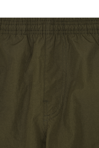 SHINOBI PLEATED HOUSE SHORTS IN OLIVE