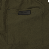 SHINOBI PLEATED HOUSE SHORTS IN OLIVE