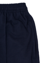 WAFFLE WEAVE PLEATED CROPPED PANTS IN NAVY BLUE