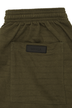 STRIPED PIQUE PLEATED ULTRA WIDE PANTS IN OLIVE