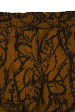 "VINES AND THORNS" 7 POCKET LOUNGE PANTS IN RUST