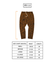 "VINES AND THORNS" 7 POCKET LOUNGE PANTS IN RUST