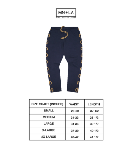 "M'$ & BEYOND" TRACK PANTS IN NAVY BLUE